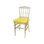 Amber resin Napoleon chair with Yellow cushioned seat, high spindled backrest and translucent event-grade frame