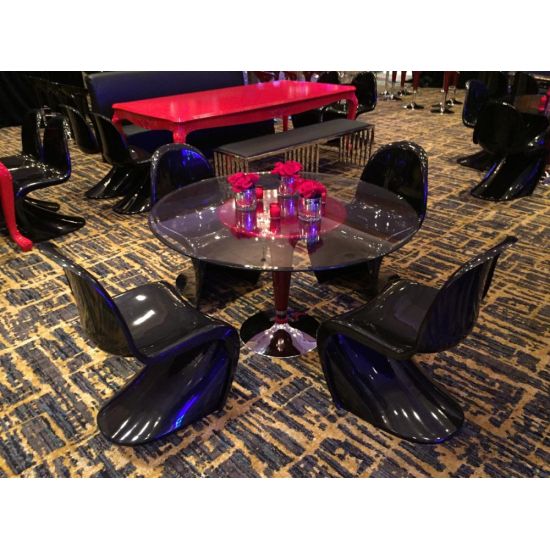Yellow Phantom chair made of molded resin with fluid one-piece silhouette and high curved backrest, sleek modern event seating