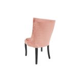 Isabella dining chair with Light Pink upholstered seat and curved high back, black wood legs, sleek modern seating for weddings and events.