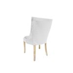 Isabella dining chair with white upholstered seat and curved high back, natural wood legs, modern seating for weddings, parties, and events.