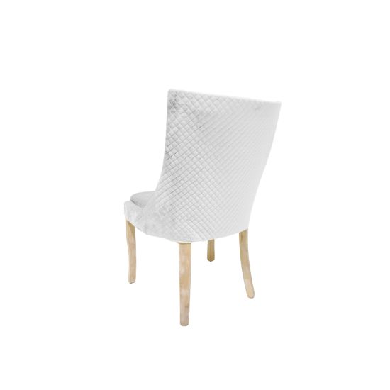 Isabella dining chair with white upholstered seat and curved high back, natural wood legs, modern seating for weddings, parties, and events.