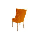Isabella dining chair with Orange upholstered seat and curved high back, natural wood legs, modern seating for weddings, parties, and events.