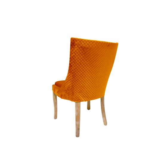 Isabella dining chair with Orange upholstered seat and curved high back, natural wood legs, modern seating for weddings, parties, and events.