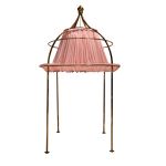 Gold birdcage canopy with pink hanging fabric fringe inside, statement ceremony structure for weddings and luxury event décor styling.
