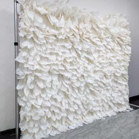 White feather-style plume wall backdrop with layered soft texture, elegant wedding photo backdrop panel for events and stages.