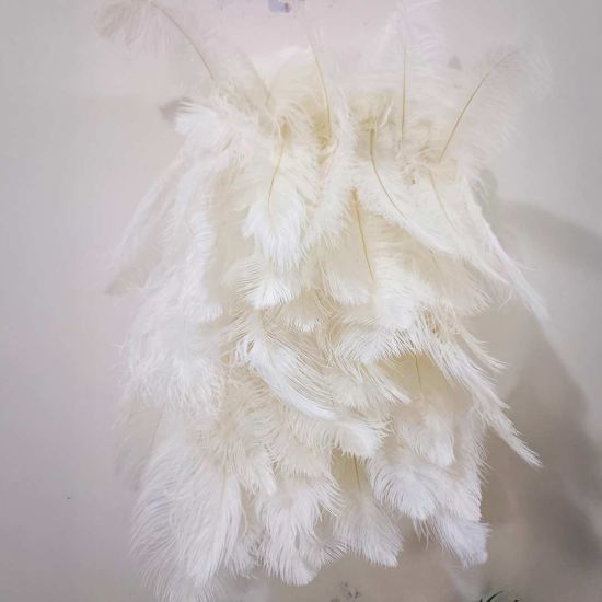 White feather-style plume wall backdrop with layered soft texture, elegant wedding photo backdrop panel for events and stages.