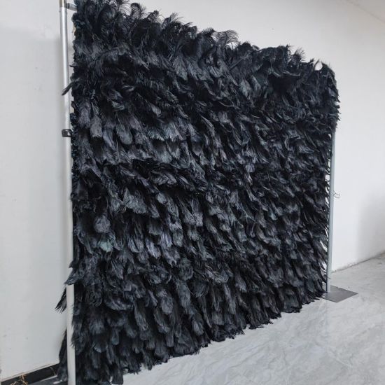 Black feather-style plume wall backdrop with layered texture, dramatic photo backdrop panel for luxury events and stage décor.