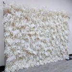 White foliage wall backdrop with layered leaf texture, elegant neutral photo backdrop panel for weddings and upscale event staging.