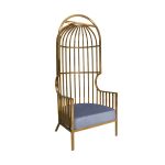 Gold dome cage armchair with vertical gold metal bars and dusty blue velvet seat cushion, modern luxury lounge chair for weddings and events.