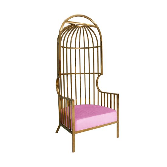 Gold dome cage armchair with vertical gold bars and light pink velvet seat cushion, modern luxury lounge chair for weddings and events.