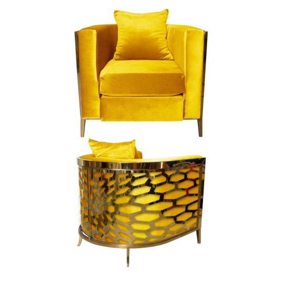 Yellow velvet accent chair with gold frame and curved mirrored back featuring abstract kaleidoscope geometric pattern, luxury art deco lounge seating.