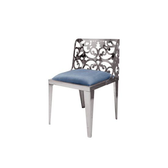 Silver reflection chair with ornate laser-cut scroll backrest and dusty blue cushioned seat, sleek modern design for upscale event dining and seating.
