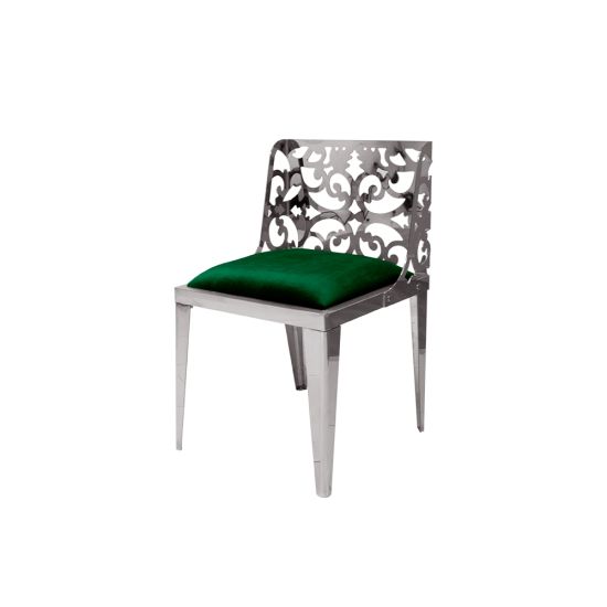 Silver reflection chair with ornate laser-cut scroll backrest and emerald green cushioned seat, sleek modern design for upscale event dining and seating.