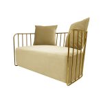 Ivory velvet accent loveseat with gold metal bar frame and two black pillows, modern art deco lounge seating for luxury events.