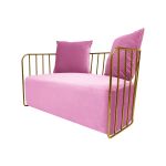 Light Pink velvet accent loveseat with gold metal bar frame and two black pillows, modern art deco lounge seating for luxury events.