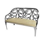 Reflection butterfly loveseat with silver metal cutout backrest and Ivory velvet seat cushion, elegant modern seating for upscale events.
