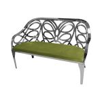 Reflection butterfly loveseat with silver metal cutout backrest and Moss velvet seat cushion, elegant modern seating for upscale events.