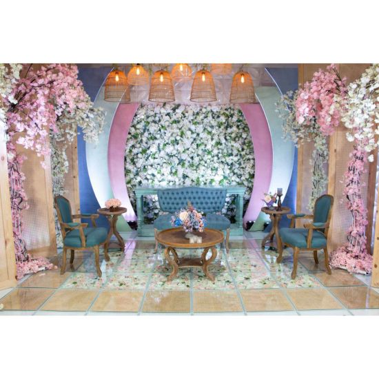Vintage Paxton armchair with distressed wood frame and dusty blue upholstery, elegant seating for weddings, lounges, and events.