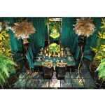 Gold stainless-steel Gem-frame end table with diamond-inspired geometry and glass top, ideal for luxury modern event lounge décor