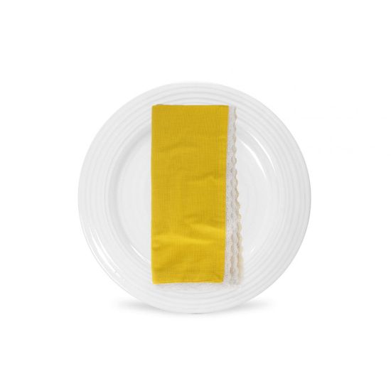Yellow table napkin with white lace trim detail, neatly folded on a white plate for bright spring weddings and event table settings