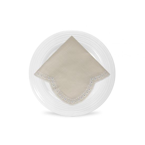 Ivory Scaloppini napkin with scalloped edge and stitched trim detail, folded on a white plate for classic weddings and elegant event décor