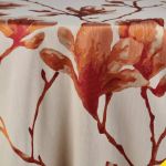 Ginger orange Aria textured round event tablecloth with subtle pattern for weddings, receptions, showers, and upscale party décor