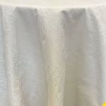 Cream Milos event tablecloth with subtle textured weave for weddings, receptions, and elegant table décor