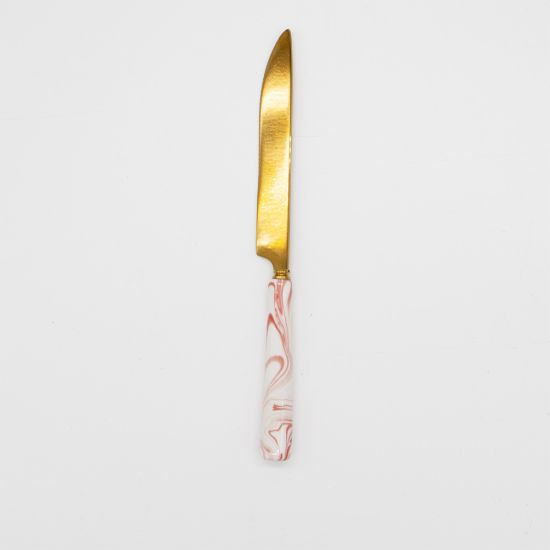 Gold dinner knife with pink-and-white marble ceramic handle, premium disposable flatware for formal dinners, weddings, and events.