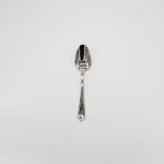 Silver Victorian-style dessert spoon with ornate handle, elegant disposable flatware for desserts, showers, and upscale event tablescapes.