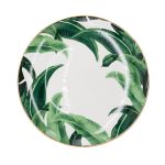 Banana leaf dinner plate with bold green foliage print framing the rim and gold edge, round design on a white background for tropical events