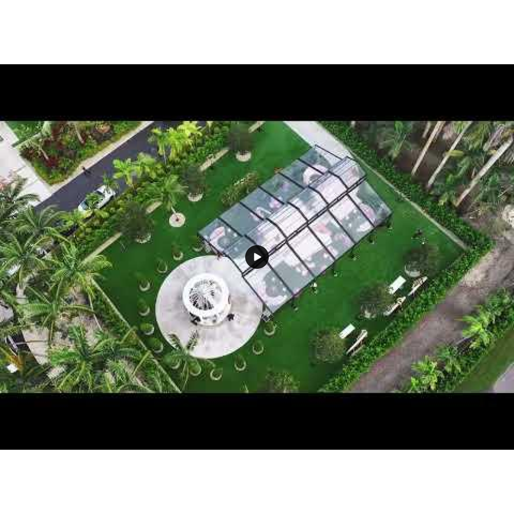 30′x10′ cathedral tent with black frame and clear top for elegant outdoor weddings and upscale events