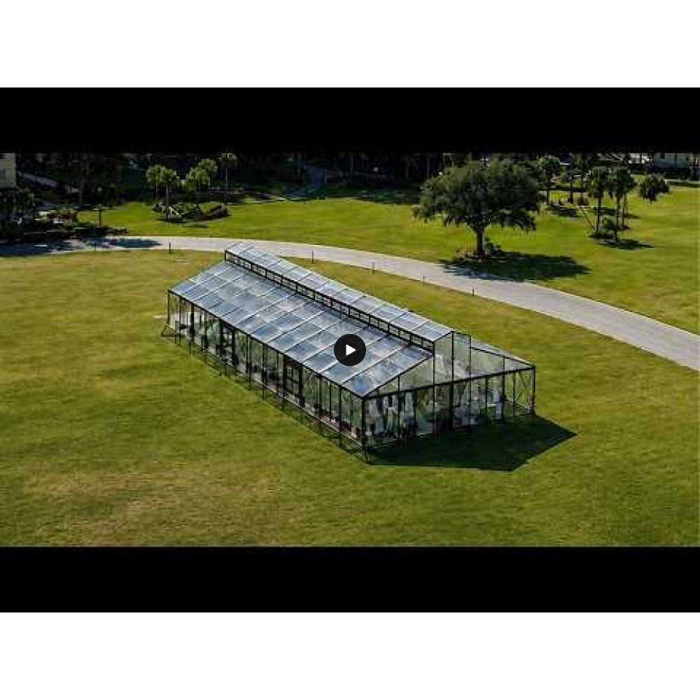30′x20′ cathedral tent with black frame and clear top for elegant outdoor weddings and upscale events
