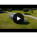 30′x20′ cathedral tent with black frame and clear top for elegant outdoor weddings and upscale events
