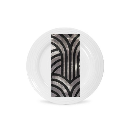 Silver art deco patterned napkin with bold geometric design folded on a white plate, sleek modern accent for weddings and event décor