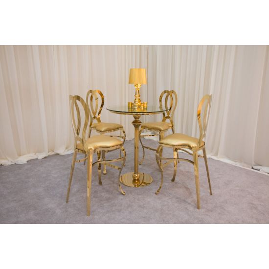round gold-finish Reflection high-boy cocktail table with sleek pedestal base for luxury event rental