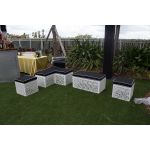 L-shaped Maze bench with black cushioned top and white geometric base, modern modular lounge seating for weddings and events.