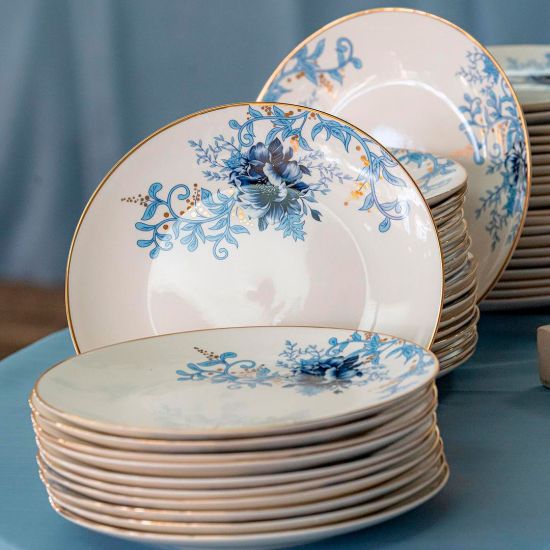 Lenox Garden Grove charger plate with white center, blue floral border accent, and thin gold rim, large round plate on a white background