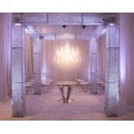 Square crystal mandap structure with mirrored pillars and chandelier centerpiece, luxury wedding ceremony canopy for upscale events.