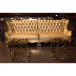 Silver stainless-steel Reflection Web coffee table with open lattice web-style base and sleek top, designed for modern event lounge décor