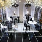 Gold wire-frame table lamp with open cage shade and round base, elegant accent lighting for weddings, lounges, and event décor styling.