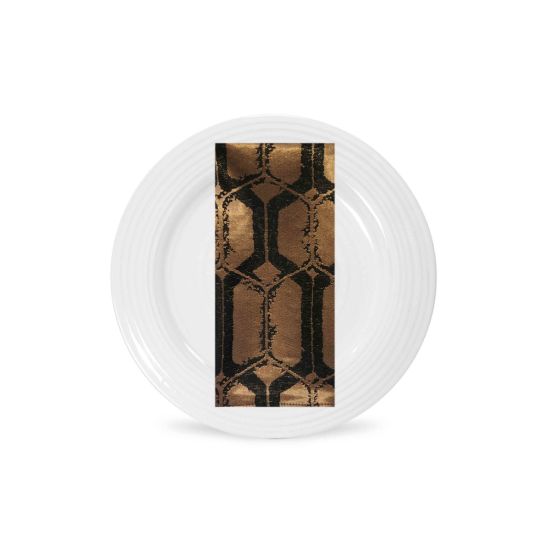 Gold croc-pattern napkin with textured reptile-style design folded on a white plate, luxe accent for wedding receptions and event tables