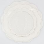 Bordallo embossed dinner plate in white with raised leaf-inspired rim texture and scalloped edge, round design on a white background for tables