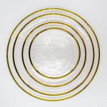 Eclipse dessert plate with white textured surface and thin metallic gold rim, round minimalist design on a white background for elegant table settings