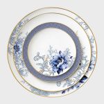 Lenox Garden Grove dinner plate with white center, blue floral detail near rim, and thin gold trim, round design on a white background