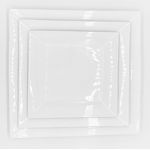 White square salad plate with slightly raised rim and subtle corner detailing, medium square plate on a white background