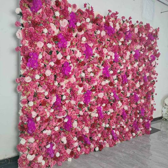 Bright fuchsia flower wall backdrop with dense mixed blooms, bold romantic photo backdrop panel for weddings and event décor styling.