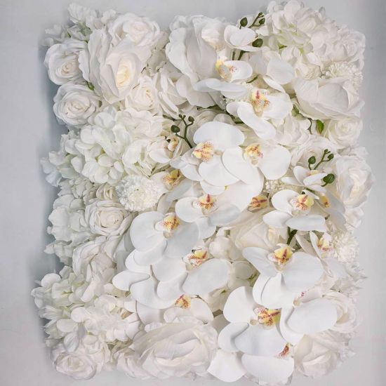 White orchid-style flower wall backdrop with dense blooms, elegant wedding photo backdrop panel for ceremonies and event décor styling.