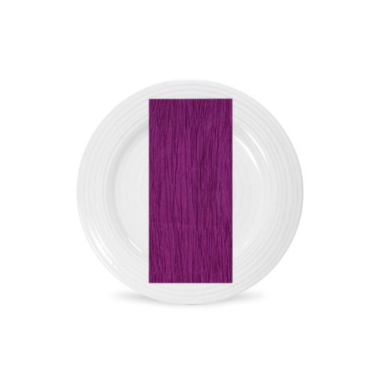 Magenta Fortuny napkin with pleated fabric texture and rich jewel tone, folded on a white plate for bold wedding tables