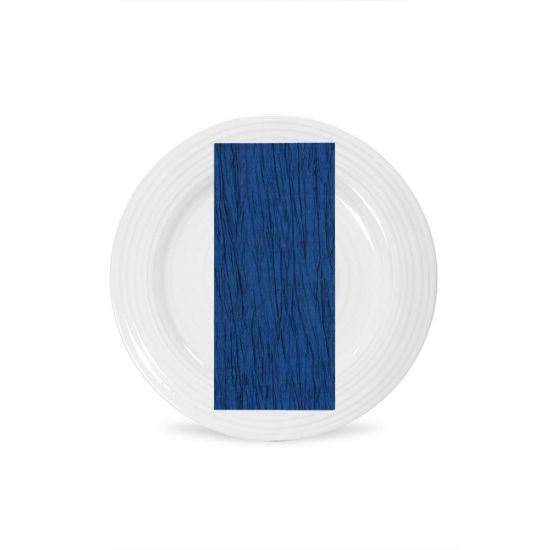 Royal blue Fortuny napkin with pleated fabric texture and deep blue tone, folded on a white plate for formal event table décor
