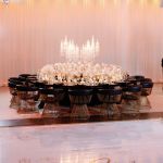 Set of 3 silver mirrored pillar candle sleeves with warm glow, modern wedding centerpiece décor for event tables and receptions.